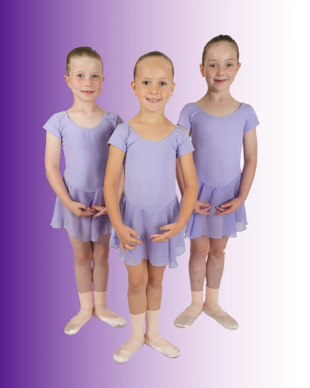 Three Galaxy Stars dancers standing together
